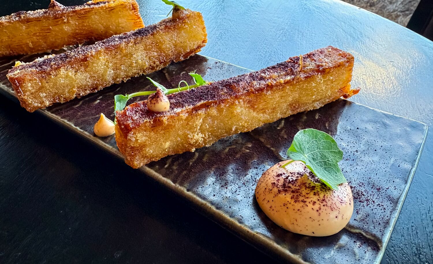 Potato Pave Crisps with Saskatoon Dust at Juniper Bistro in Banff.